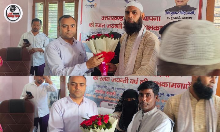 “रुड़की के हलवाहेड़ी गांव में जिलाधिकारी मयूर दीक्षित रजत जयंती सप्ताह के विशेष शिविर में ग्रामीणों की समस्याएं सुनते हुए।”